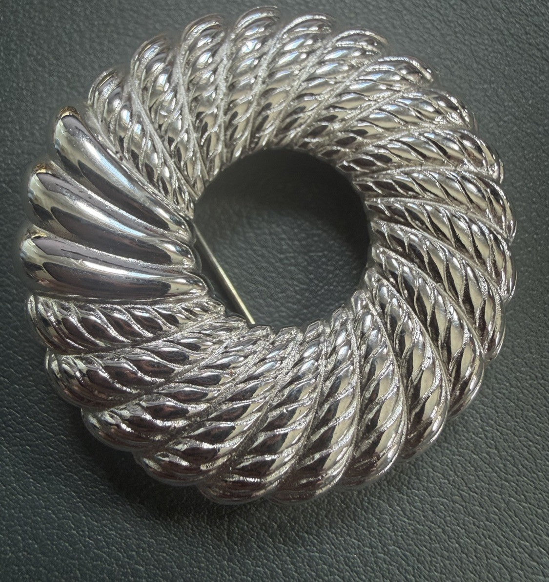 Vintage MONET Silver-Tone Circle Brooch – 1.5" Wreath Design w/ Spinning Texture