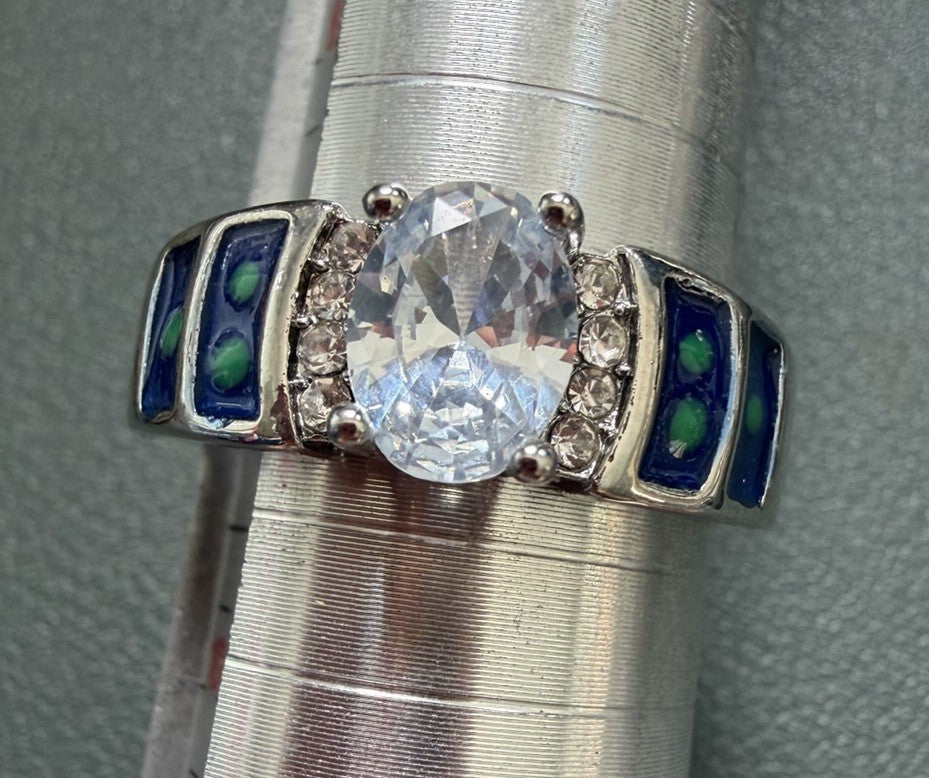 Silver Tone Ring Oval Clear Stone Blue Accents Prong Setting Band Sz 9.25