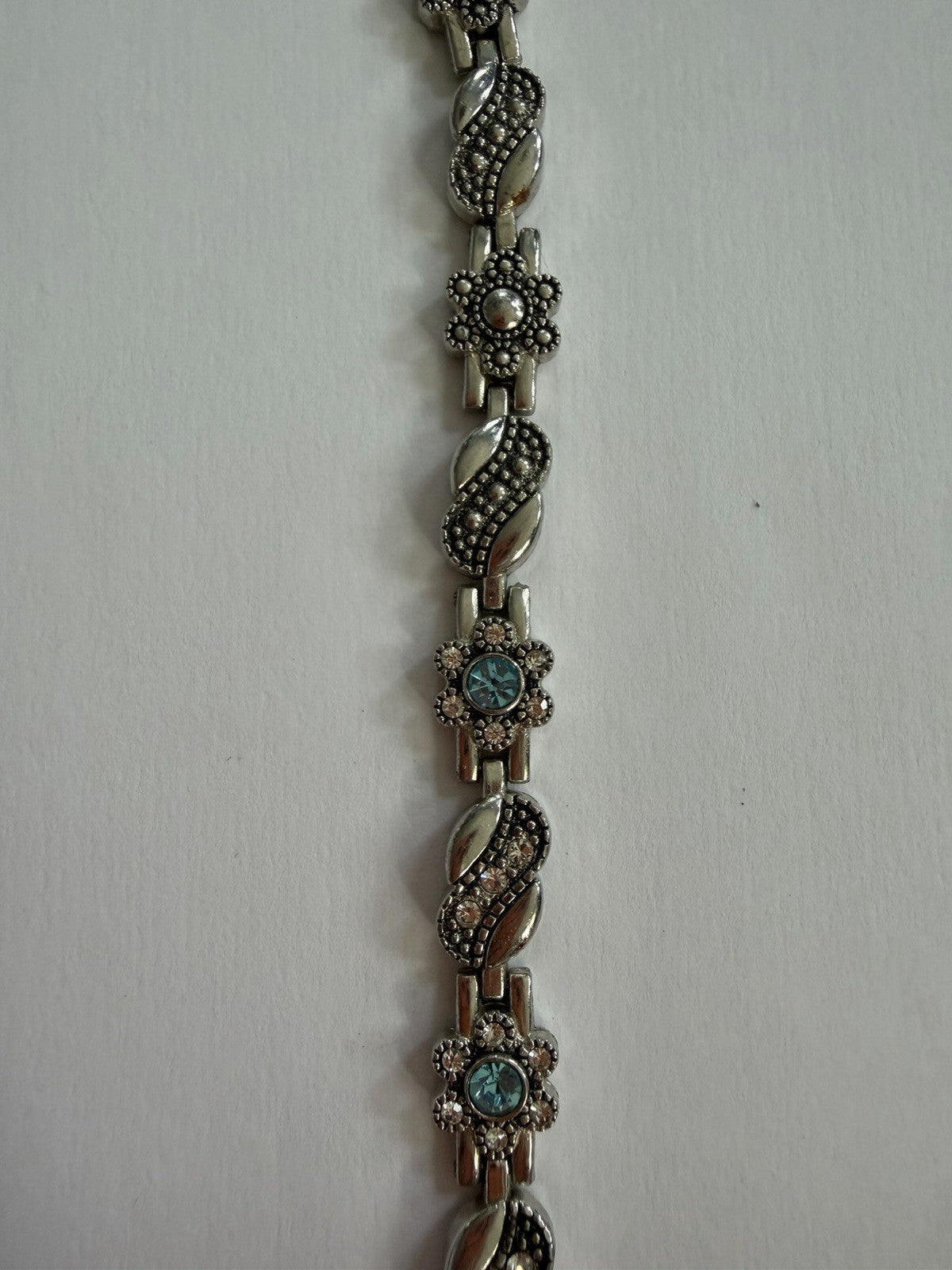 Silver-Tone Metal Chain Bracelet with Blue Flower Accents Floral Theme