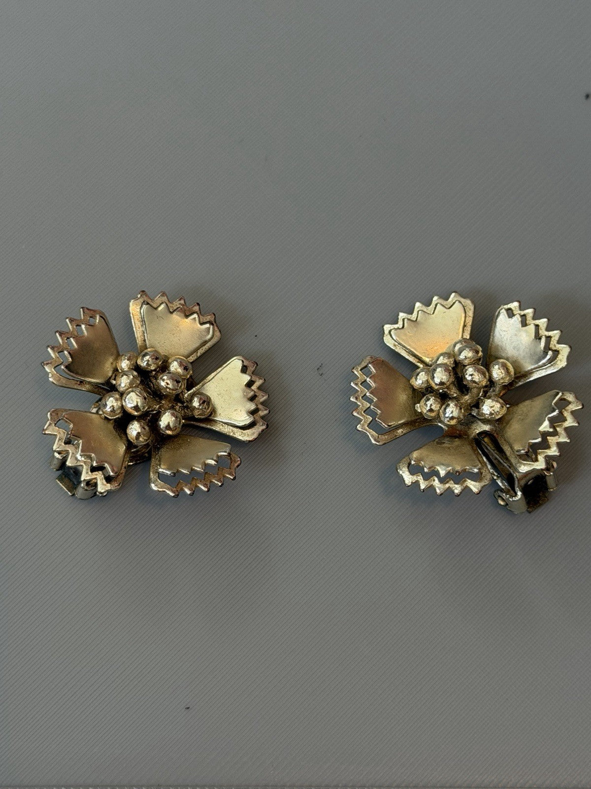 Vintage Pair Of Gold Toned Metal Flower Clip-on Earrings
