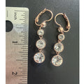 JCM Gold Tone Crystal Earrings Leverback Round 6 Clear Stones 