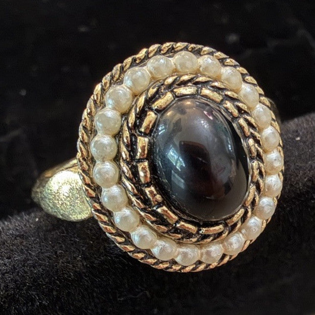 Avon Gold Tone Halo Ring Black Oval Cabochon Faux Pearl Signed Size 5